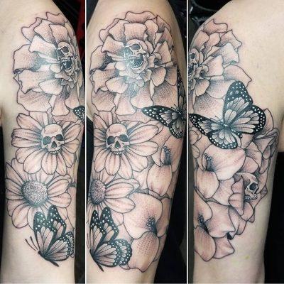 Flower and skull tattoo