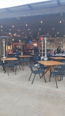 Covered outdoor seating with lots of heaters