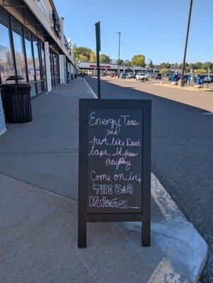 Sandwich board with a simile