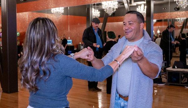 Students share a salsa dance