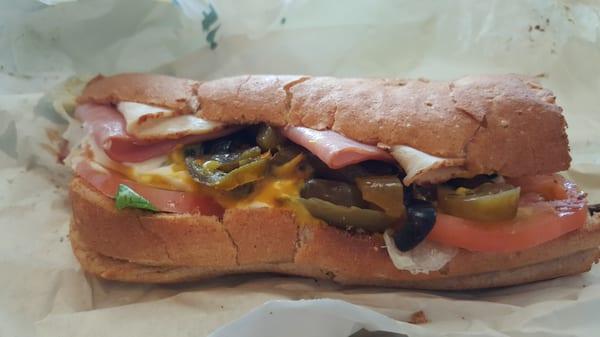 The sweet peppers are a good addition to this Ham & Turkey sub (6" with soda & chips = $8.30)