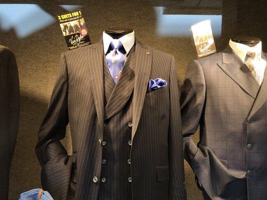 All wool imported suits included in the 3 for 1 sale