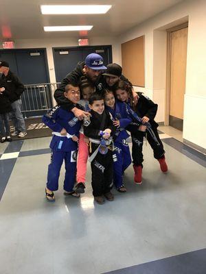 Jason with his students at a tournament