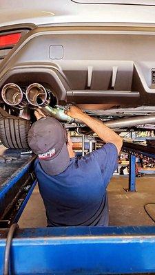 Marcos making sure exhaust is nice and secure!