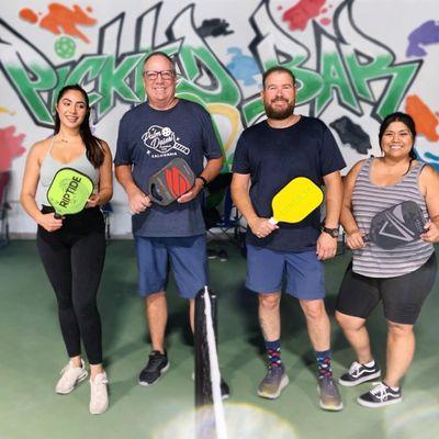 Coach Miles Aaron Pelky with some new Pickleball players