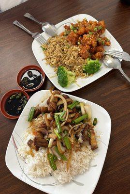 stir fried crispy pork belly served with white rice.  orange chicken served with fried rice.