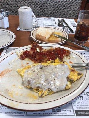 Sausage and cheese omelette with sausage gravy