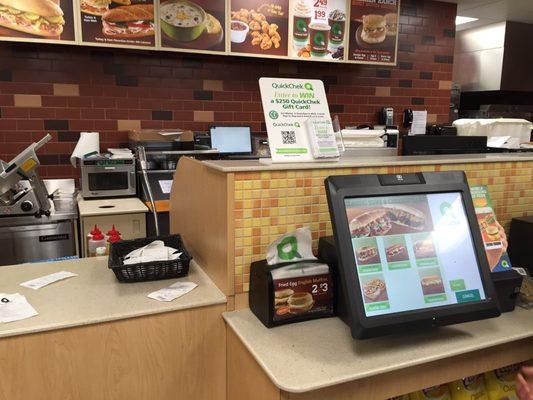 Automated food ordering system. When you pay an electronic message is sent, no need to bring a stamped receipt here for pick up!