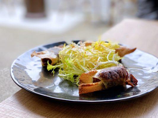 Bonbons de Foie Gras: Foie gras & medjool dates, crispy brick pastry, piment d'espelette, frisée salad | 3 pc-$10