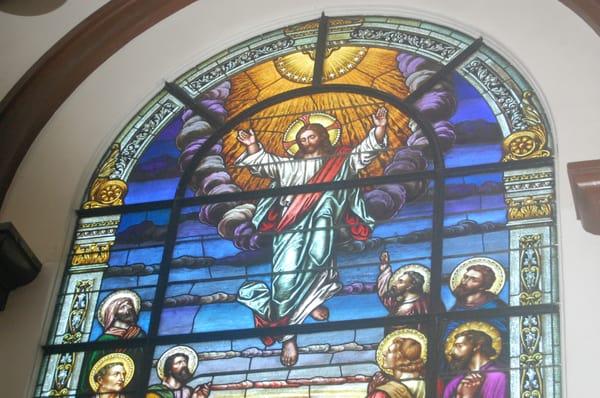 The Ascension of Jesus stained glass over one of the church doors - lovely!