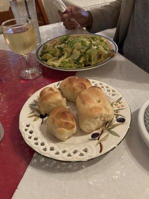 Complimentary bread, Caesar salad (choice of salad is served with many entrees)