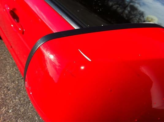 Damage to passenger side Mirror from car wash.