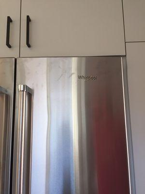 Whirlpool emblem on KitchenAid fridge