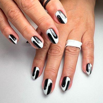 Who doesn't love black and white nails?? Hand painted by Quitzia get the look by booking Gel Manicure + Full Nail Art