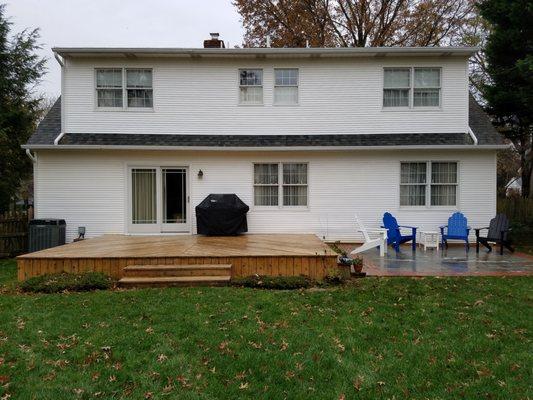 North side--clean siding, clean deck and patio.