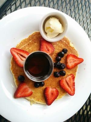 One buttermilk pancake with berries