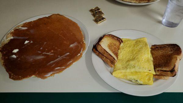 The bacon and cheese omlette with homemade toast and pancake on side so tasty, we will be back here, great food and service.