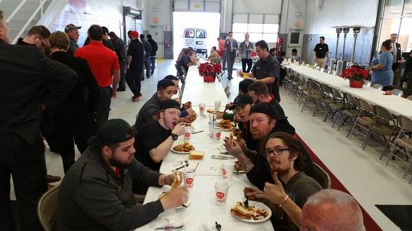 Crest Nissan Technicians enjoying a catered lunch on our service drive.