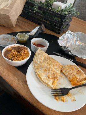 Cheese quesadilla and mixed rice and beans to-go