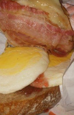 Sourdough breakfast sandwich. That bacon looks suspect...