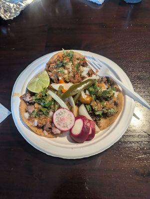 From left, clockwise: carnitas, al pastor, asada