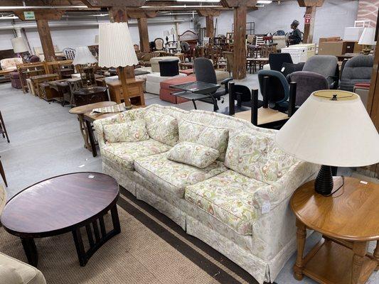 $70 for this groovy 3 section couch with 5 matching decorative pillows. The computer chairs behind the couch are also $70 a piece.