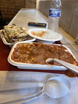 Chicken tikka masala with garlic naan and 2 water bottles $19