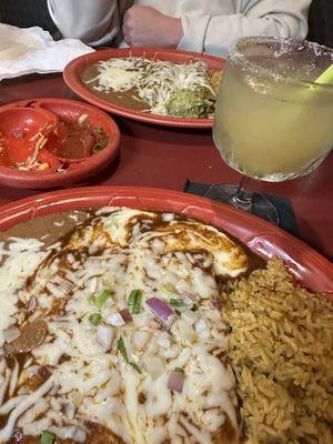 Cheese and onion enchiladas in red sauce, and chicken enchiladas in verde. PERFECTION.