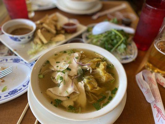 Pho with egg noodles, chicken and wontons.