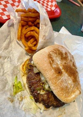 Big Boy Burger Meal - 1/2# Patty, Swiss cheese, grilled onions, grilled mushrooms tomatoes, lettuce, mustard & Mayo with side of curly fries