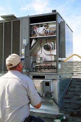 A photo taken during an air conditioning service.