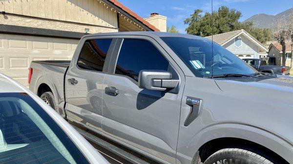 2021 F150 Rear: Dark over the OEM tint. Front: Dark tint.