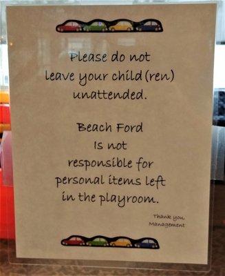 This sign is next to the entrance to the play area located at the Beach Ford Filling Station.  Photo taken April 13, 2019.