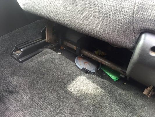 Trash not cleaned from under passenger seat