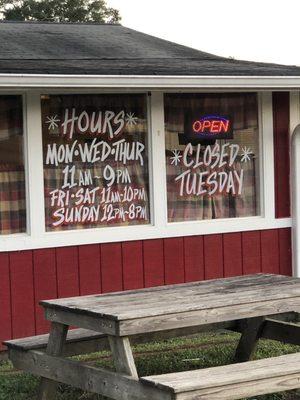 You can read their hours from the road.