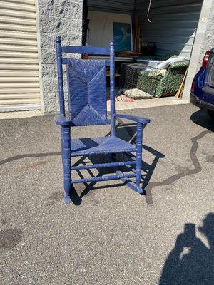 Old blue porch rocker still in good shape, sturdy, in need of another coat of paint.