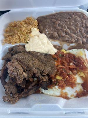 Steak and eggs with rice and beans