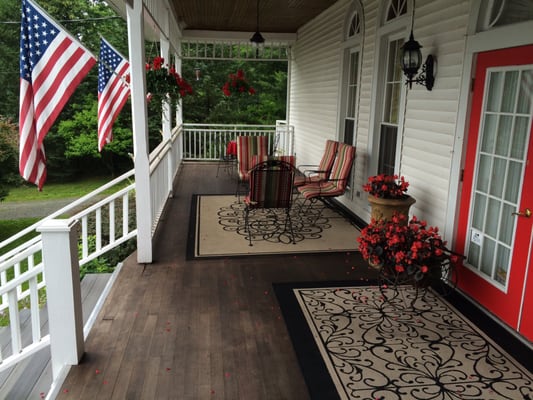 Relax on the front porch overlooking White Lake.