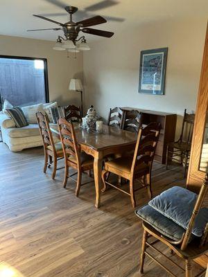 The new walls and flooring in dining/family room area