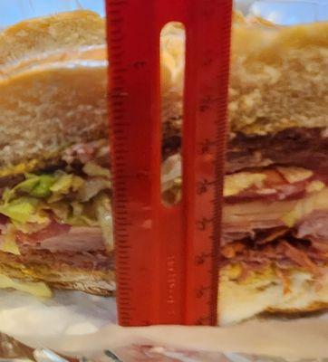 three inches tall, and I'd swear  that 2 and a half were deli.