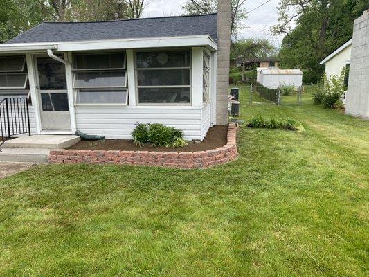 New retaining wall and top soil