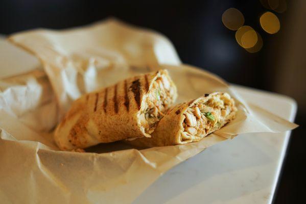 Succulent Chicken - Sliced chicken breast, crispy lettuce, tomatoes, pickles and creamy garlic sauce all wrapped in pita.