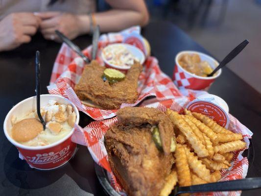 Half chicken with fries and Cole claw with banana cream pudding and peach cobbler dessert! Yummm, our Mac n cheese didn't come yet