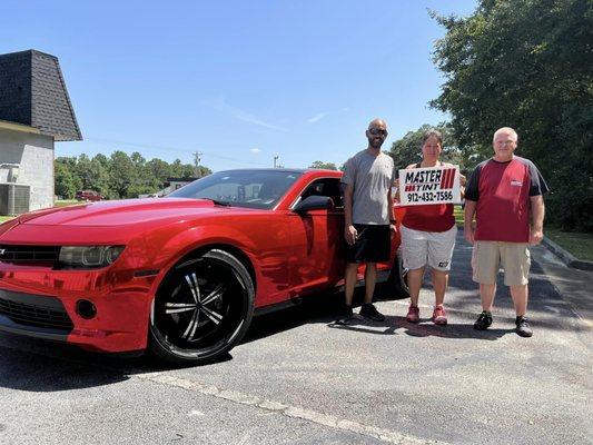 A Happy Customer with Master Tint Team!

-Chevy Camaro, Sound System Installation.