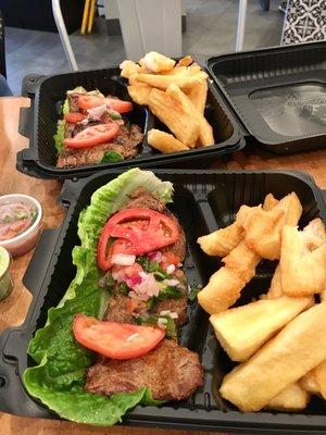 Carne Asada with fried yucca side - even in a plastic to-go box, beautifully plated lol. Now THAT'S love.