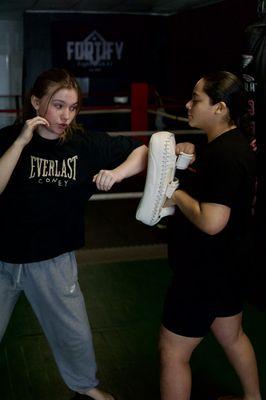 Our free women's self-defense seminars, led by Coach Savanna, are always super fun!