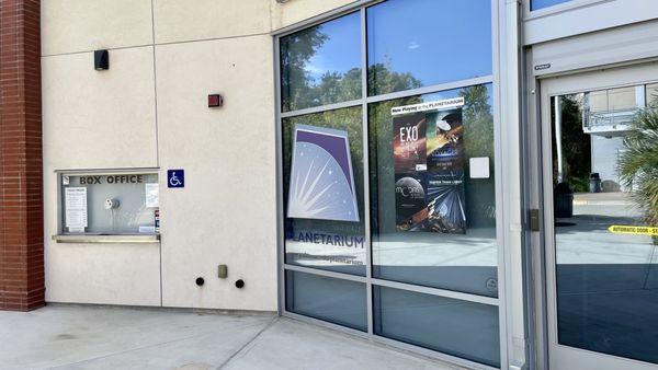 Outside: box office window to the left of main entrance