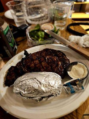 Steak night hand cut ribeye baked potato salad