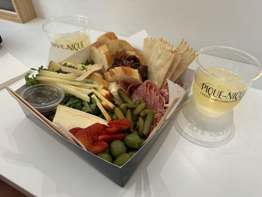 Large charcuterie box and hand picked wine