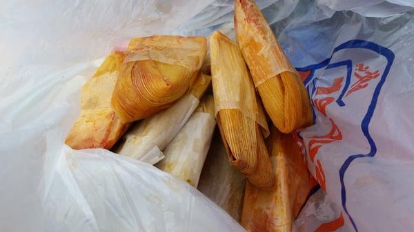 Mexican guy's van with the trunk open will be parked in the El Super parking lot selling hot fresh made tamales for $1 each.